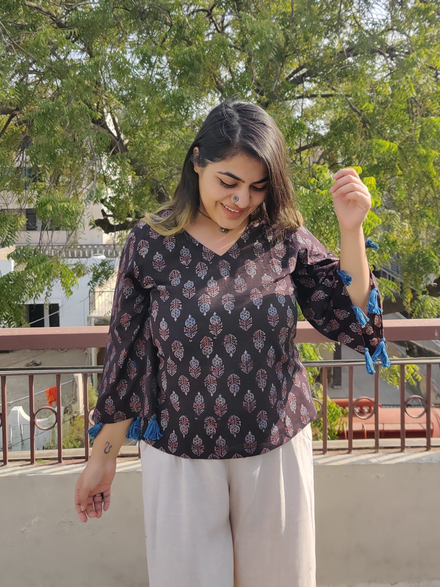 Kaala Khatta Ajrakh Bell Sleeves Top with Tassels