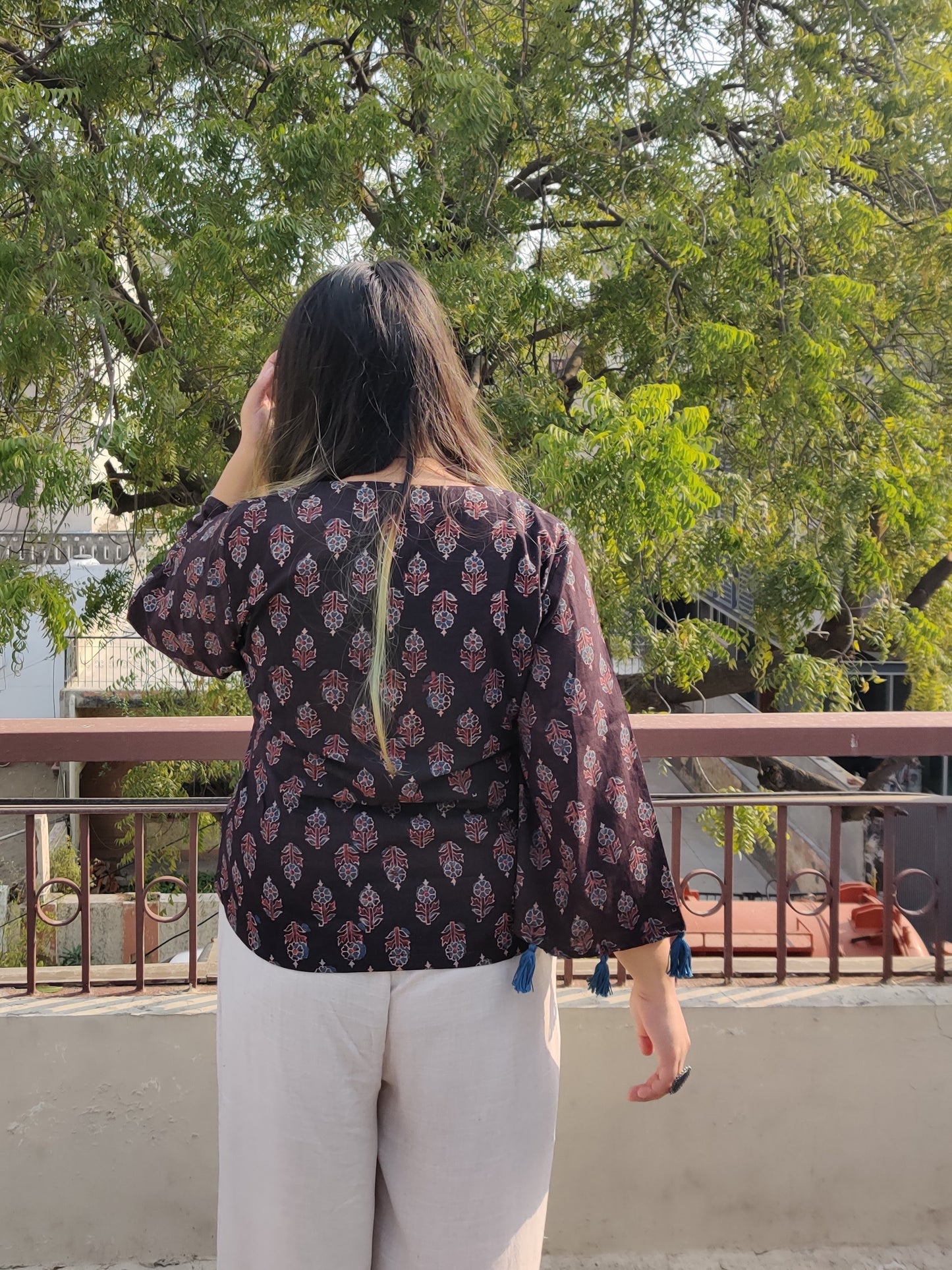 Kaala Khatta Ajrakh Bell Sleeves Top with Tassels