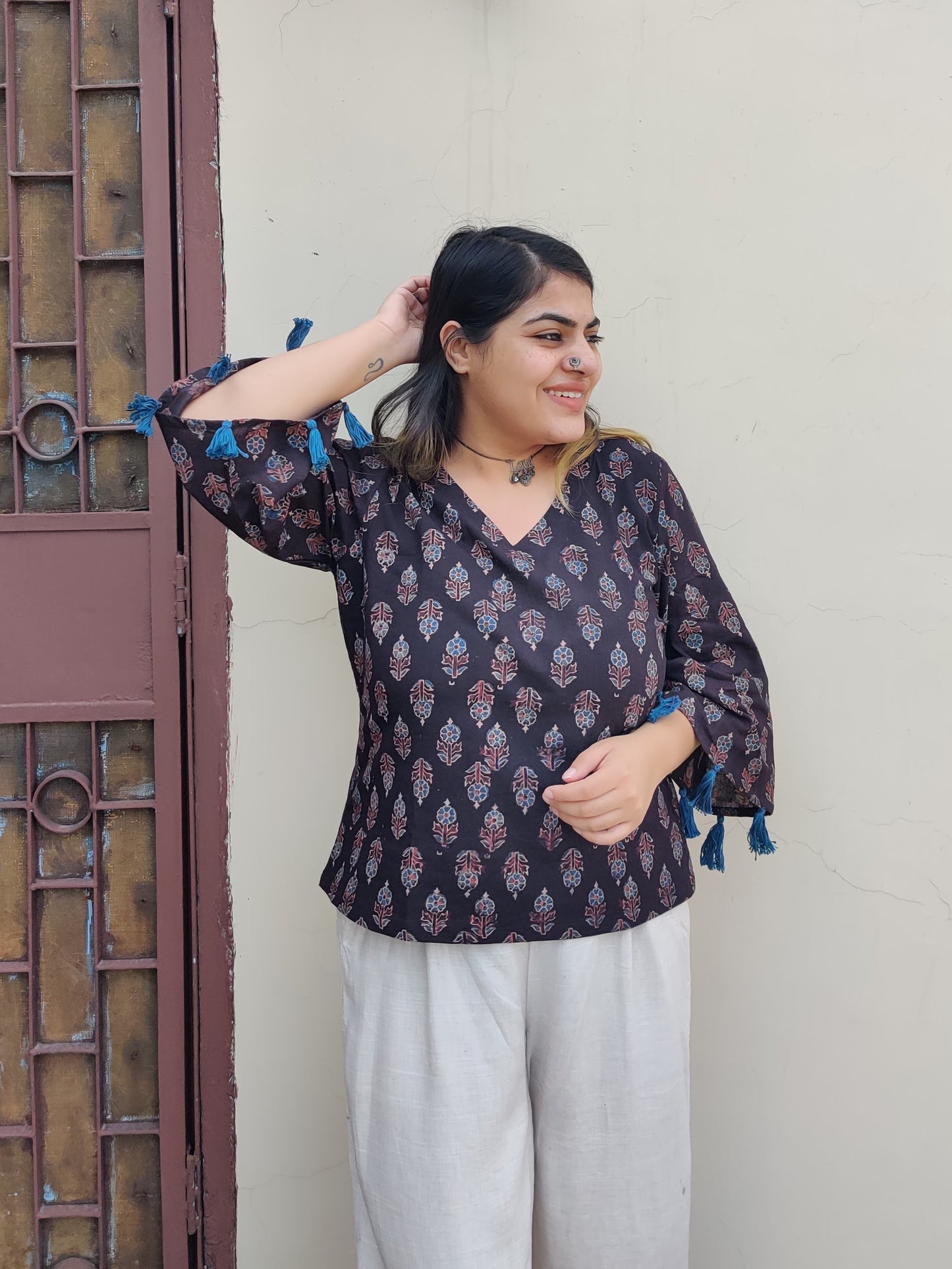 Kaala Khatta Ajrakh Bell Sleeves Top with Tassels