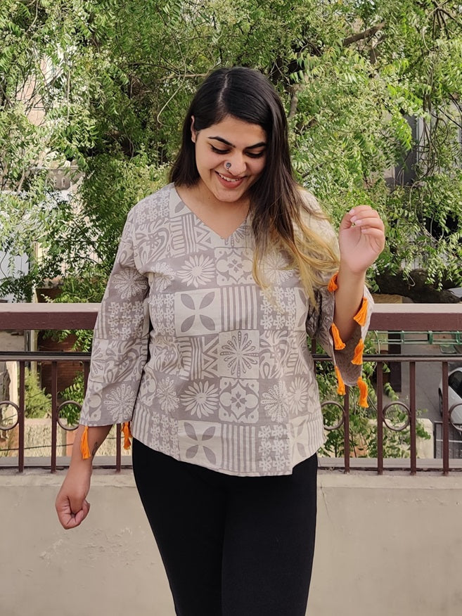 Kashish Tiles Hand block Printed Top with Bell Sleeves and Tassels