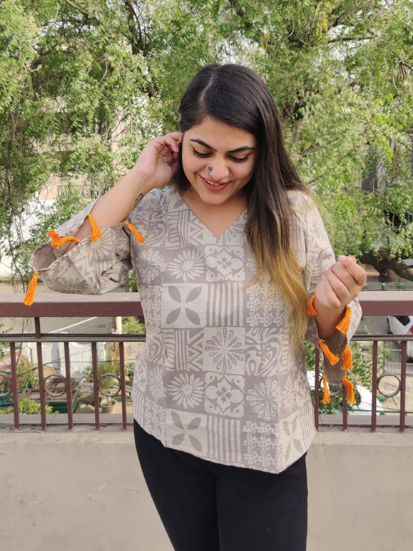 Kashish Tiles Hand block Printed Top with Bell Sleeves and Tassels